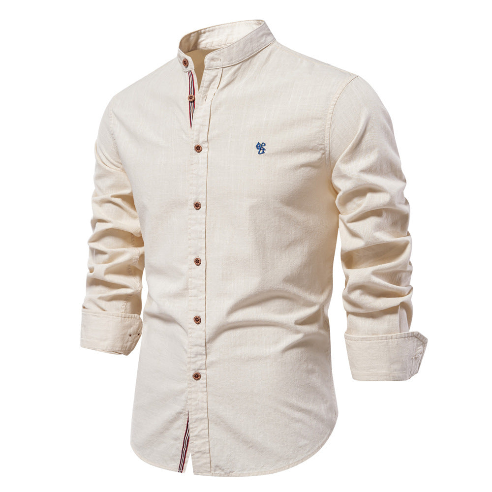 Beige long-sleeve shirt with a small logo on a white background