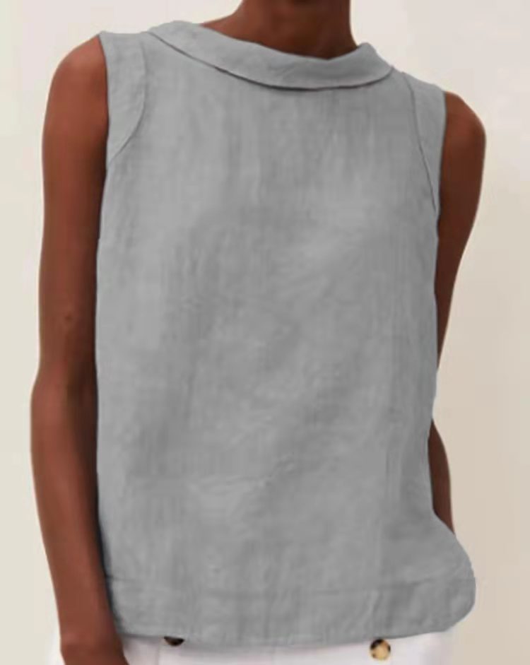 Light blue sleeveless top worn by a person on a plain background