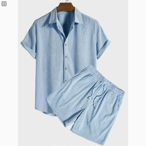 Light blue striped shirt and shorts set on a hanger against a white background