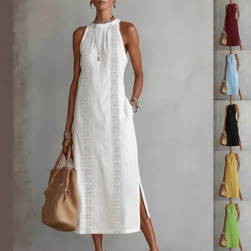 Woman wearing a white sleeveless dress with lace details, holding a brown handbag.