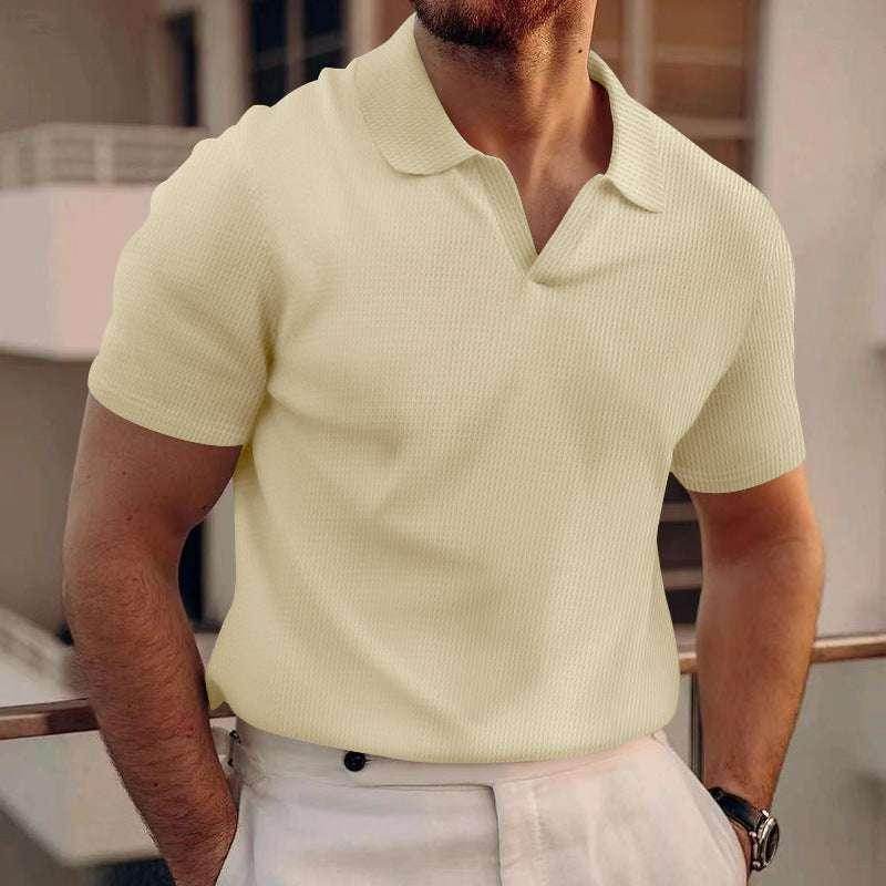 Man wearing a light yellow short-sleeve knit polo shirt from ZA-Zola, trendy summer fashion.