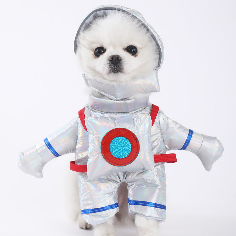 Small dog wearing an astronaut costume on a white background