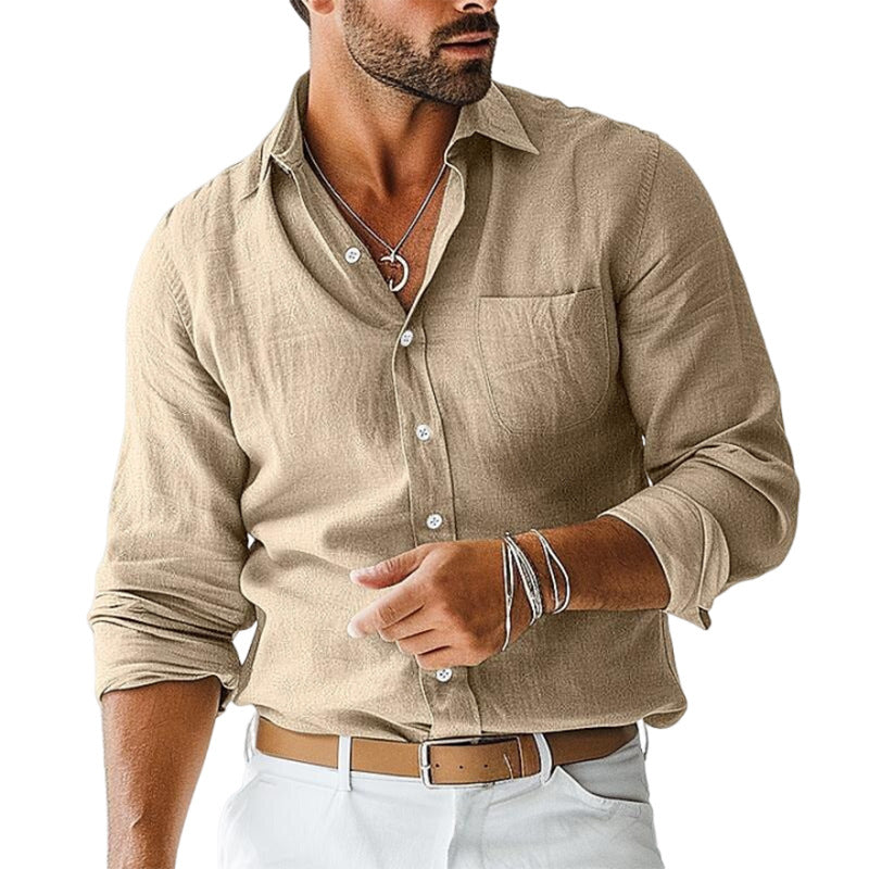 Man wearing a beige linen shirt with rolled-up sleeves on a white background