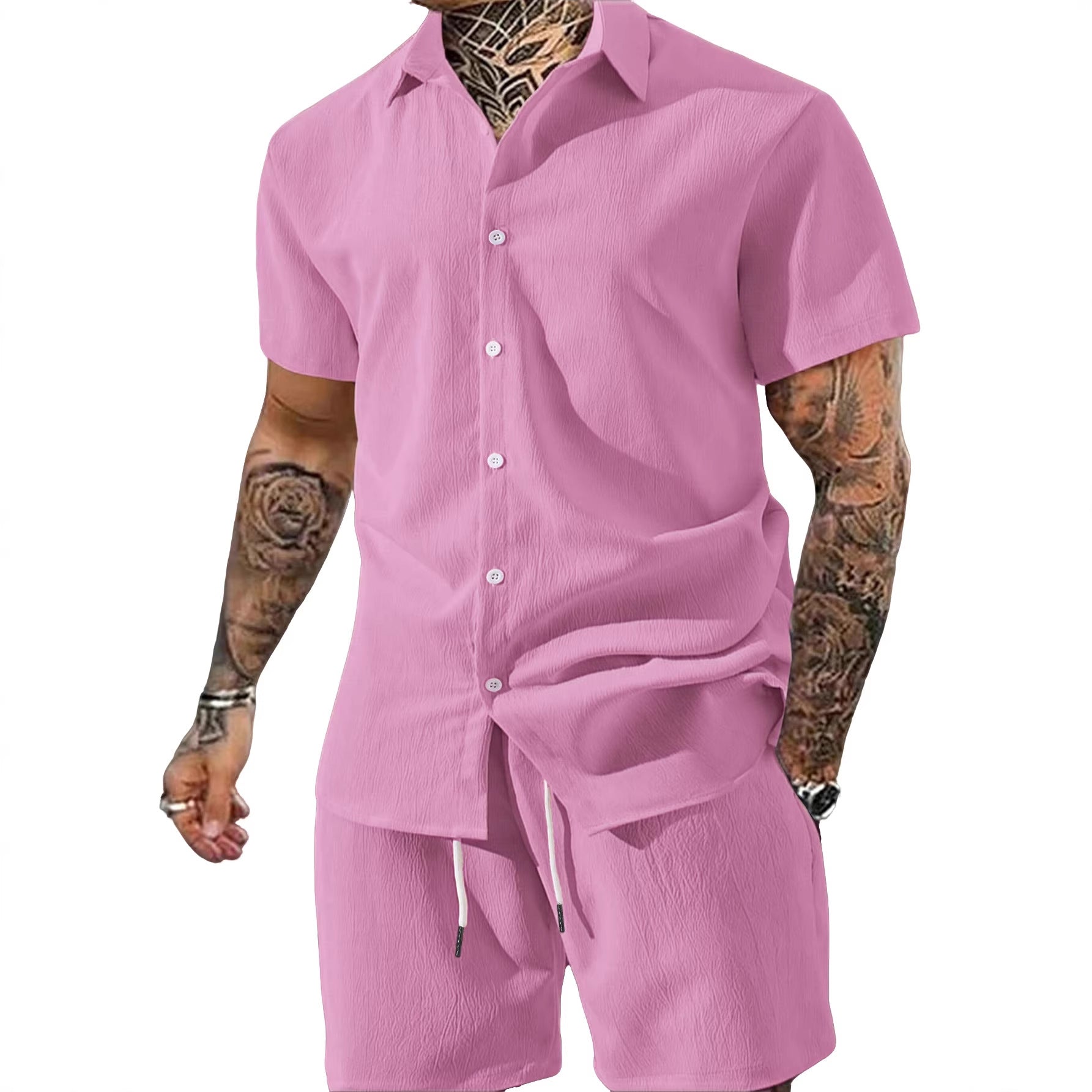 Person wearing a pink shirt and shorts set on a white background