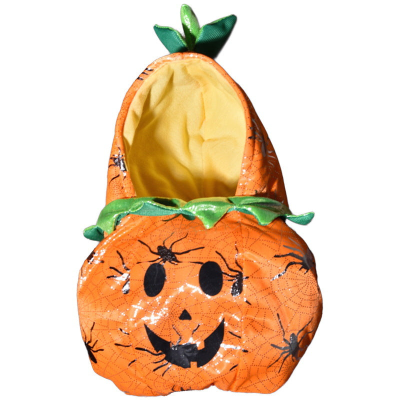 Pumpkin-shaped slippers with a jack-o'-lantern face on a white background