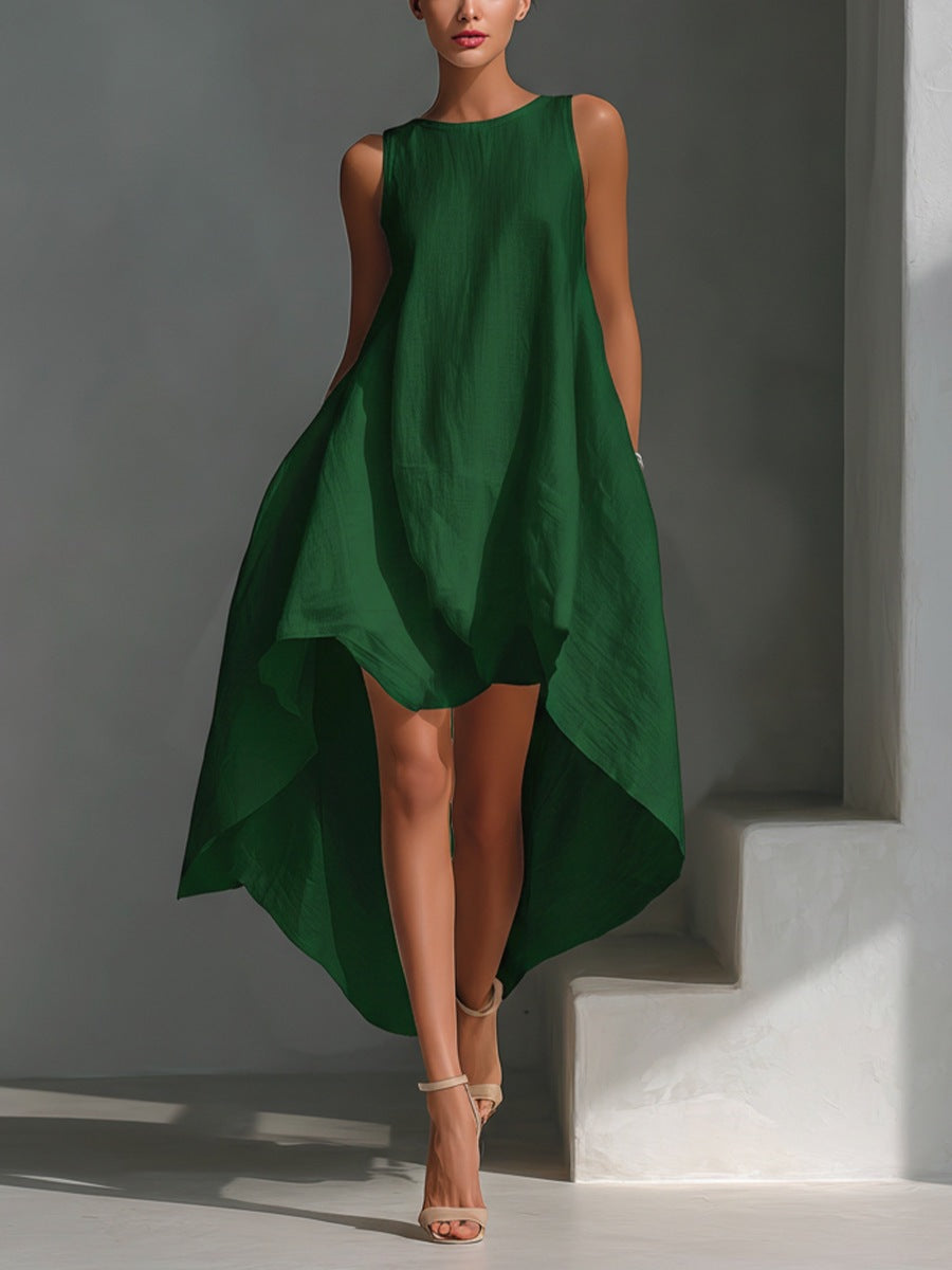 Green dress worn by a model against a gray background