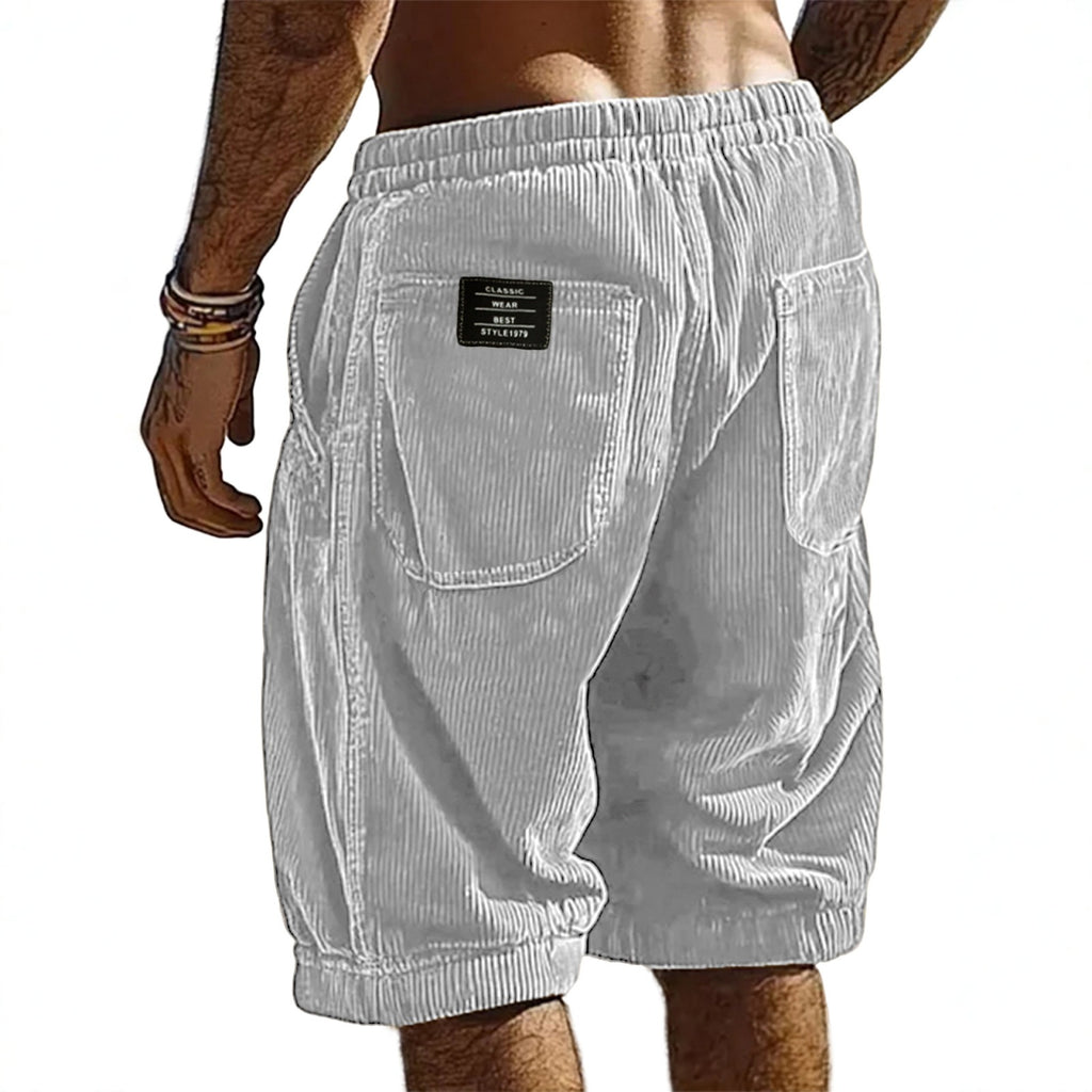 White shorts worn by a person on a white background
