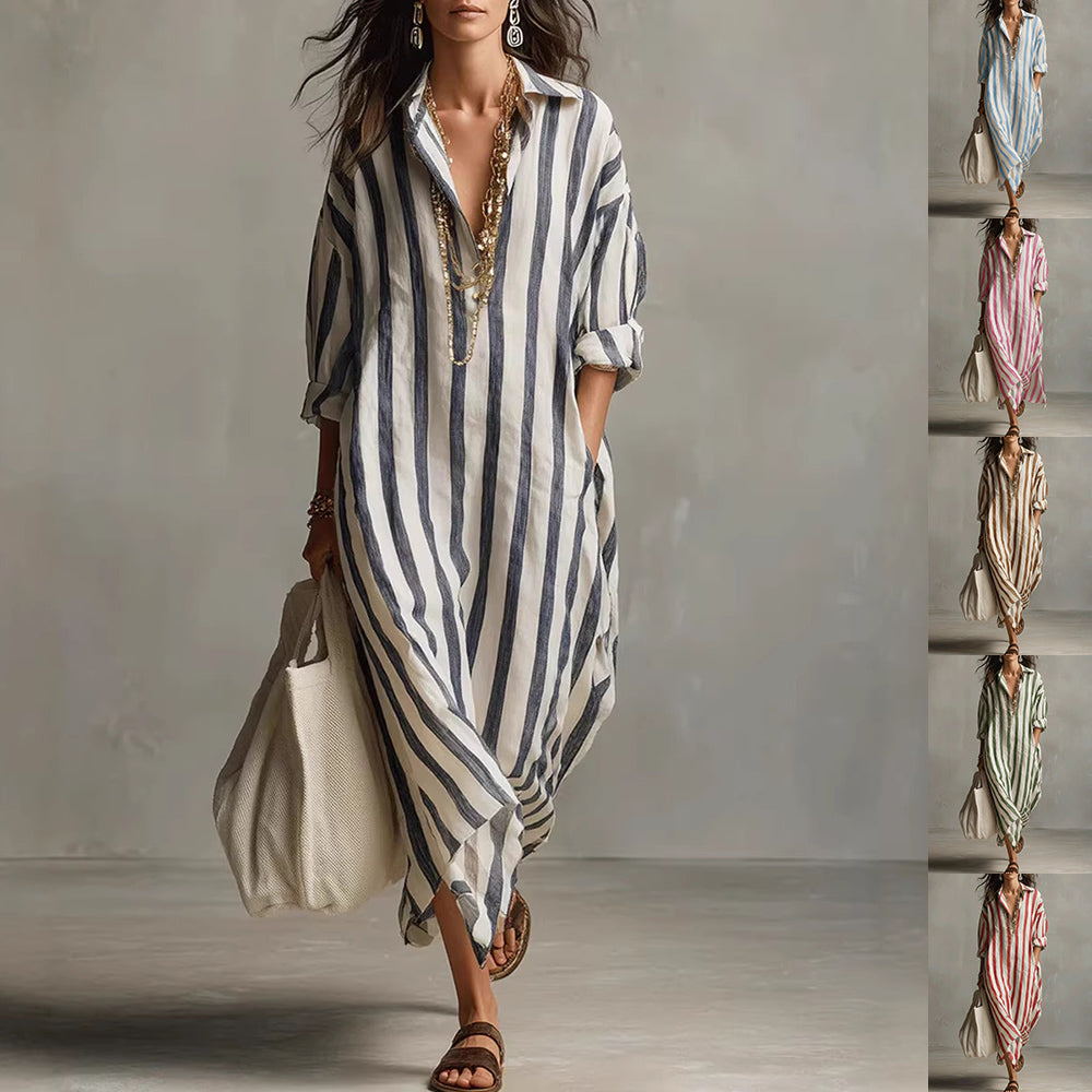 Woman wearing a striped dress with a neutral background