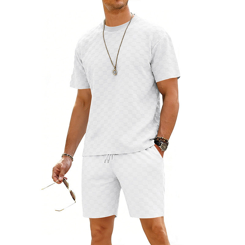 Man wearing a white t-shirt and shorts set on a white background