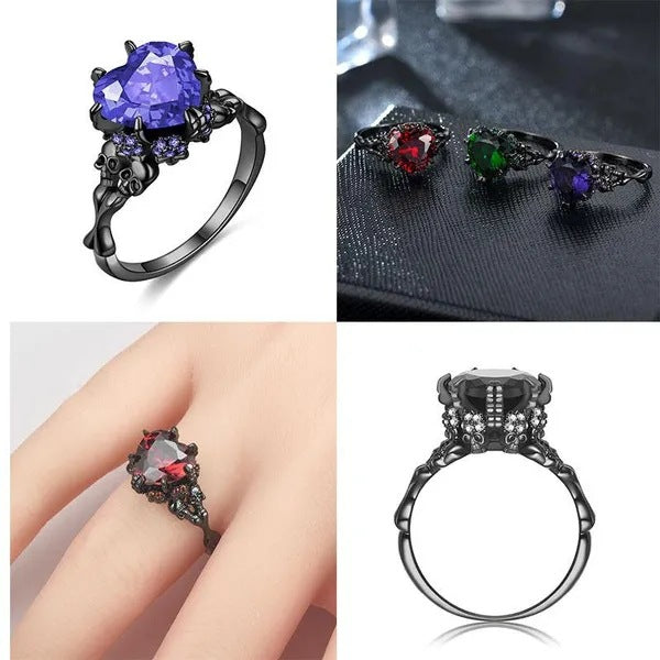 A collage showing gothic-style rings: a large black ring with a purple heart-shaped gemstone and skull details, three smaller rings in red, green, and purple on a dark surface, a ring worn on a hand, and a close-up of a black ring with a clear rectangular gemstone.