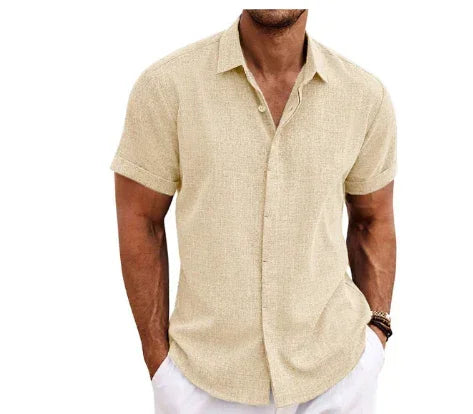 Man wearing a beige short-sleeve shirt on a white background