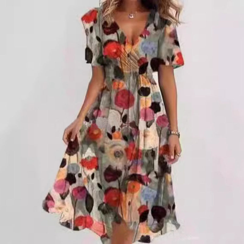 Woman wearing a colorful floral dress on a white background