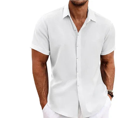 Man wearing a white short-sleeve dress shirt on a white background