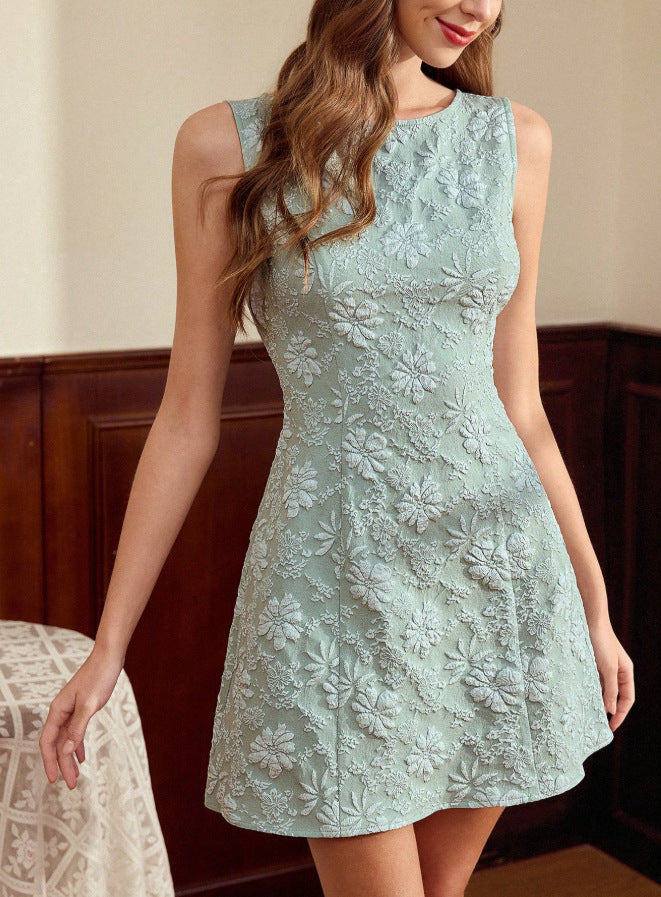 Woman wearing a light blue lace dress indoors