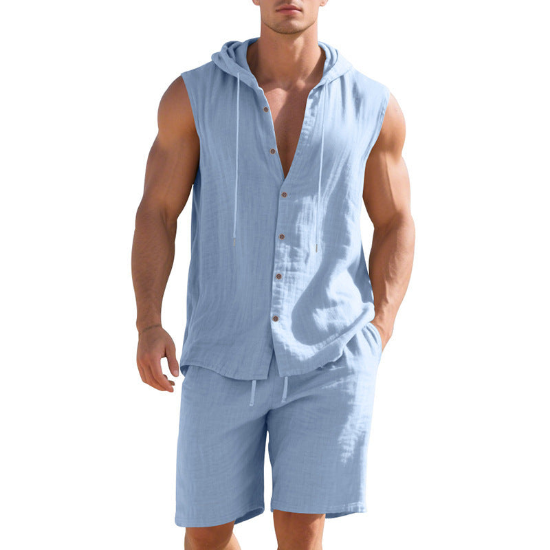 Man wearing a light blue sleeveless shirt and shorts set on a white background