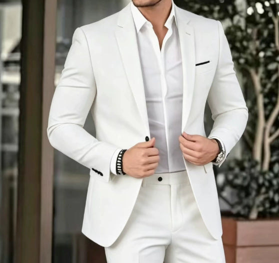 Man wearing a white suit with a blurred background
