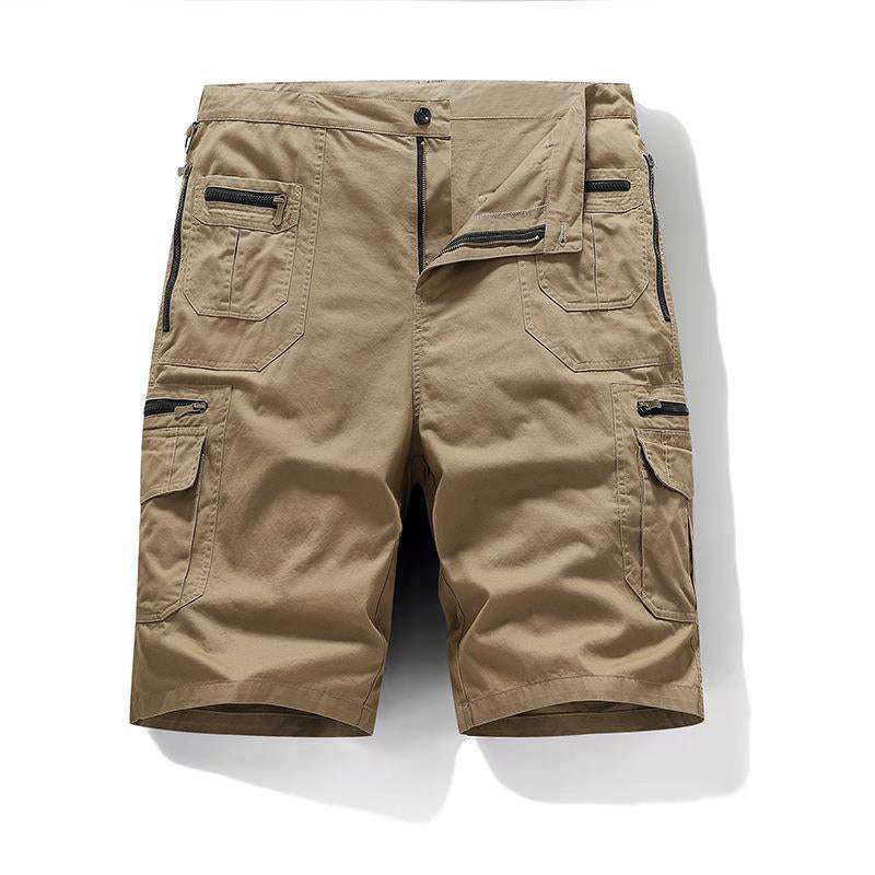 Beige cargo shorts with multiple pockets on a white background