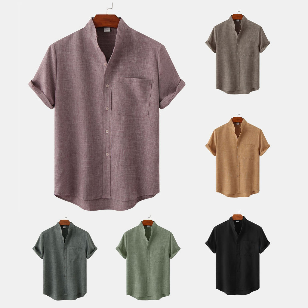 Collection of short-sleeve button-up shirts in various colors on a white background