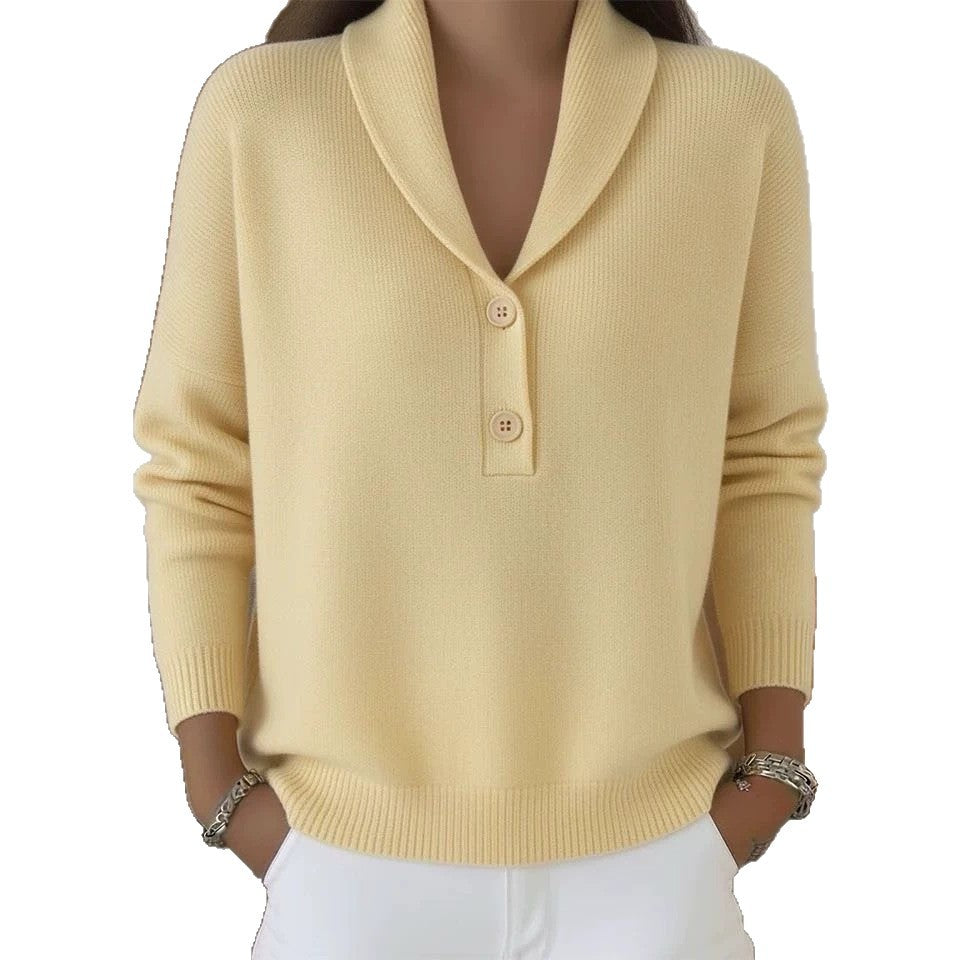 Beige sweater worn by a person on a white background