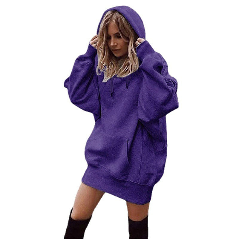 Person wearing a purple hoodie on a white background