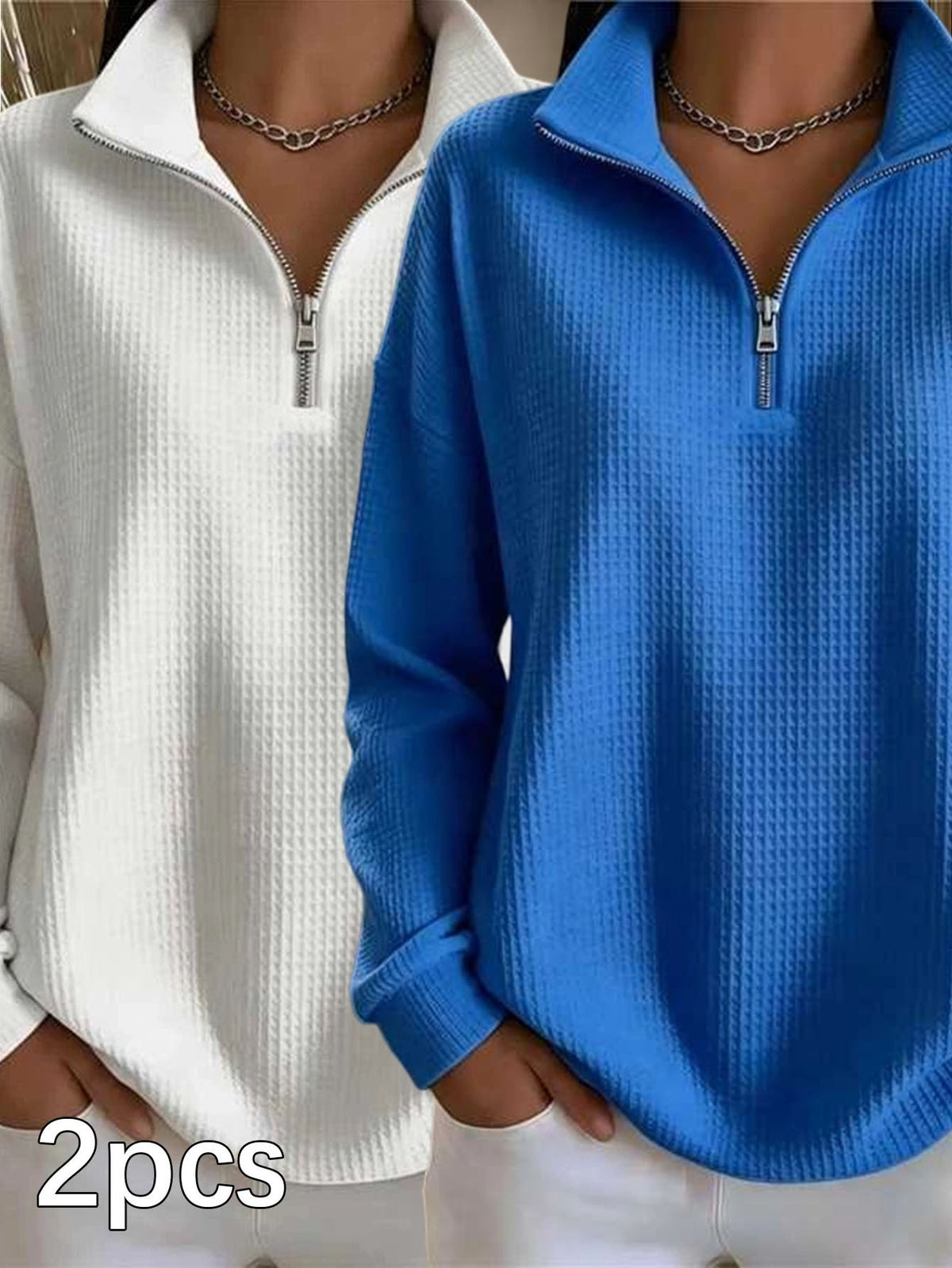 Two women wearing quarter-zip long-sleeve waffle-knit tops, one in white and one in bright blue, shown side by side with a '2pcs' text overlay in the bottom left corner.