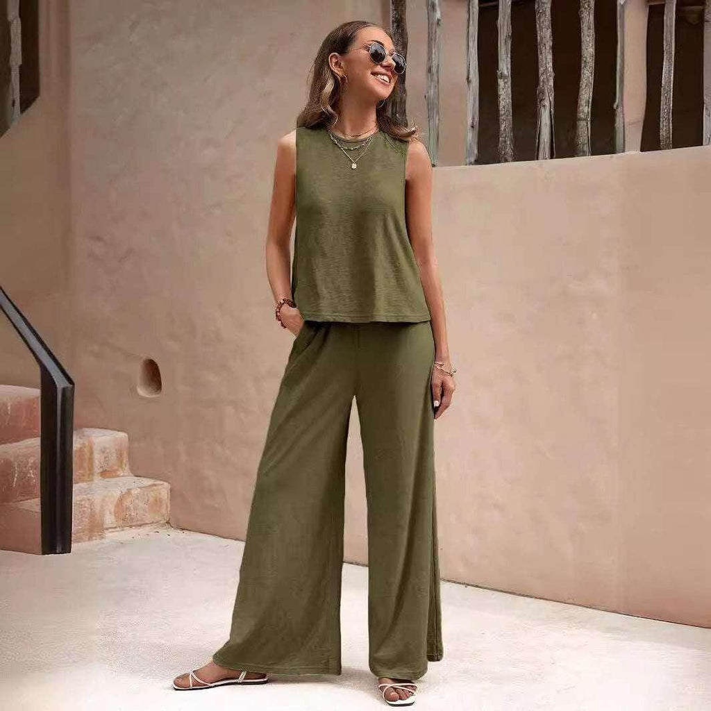 Woman wearing olive green sleeveless wide-leg jumpsuit, chic summer ZA-Zola fashion style