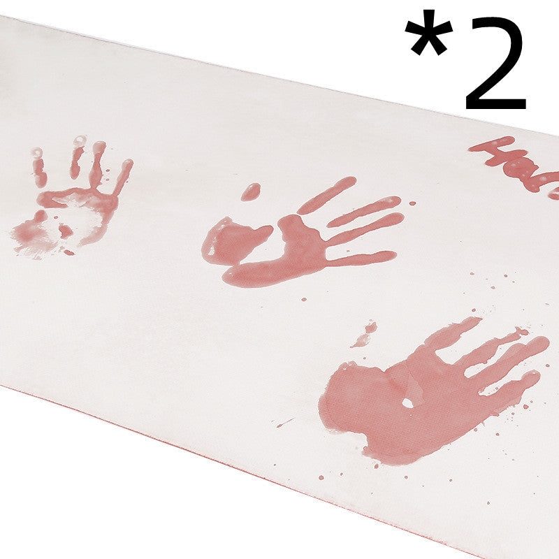 White board with red handprints and text, used for educational purposes.