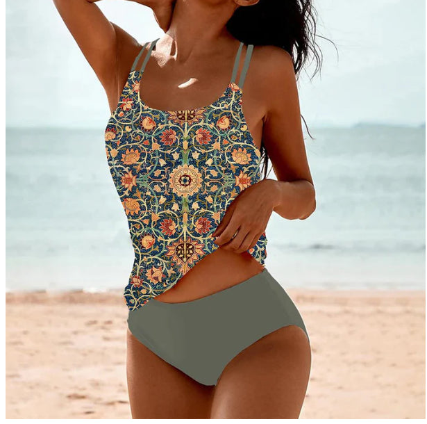 Woman wearing a floral swimsuit on a beach