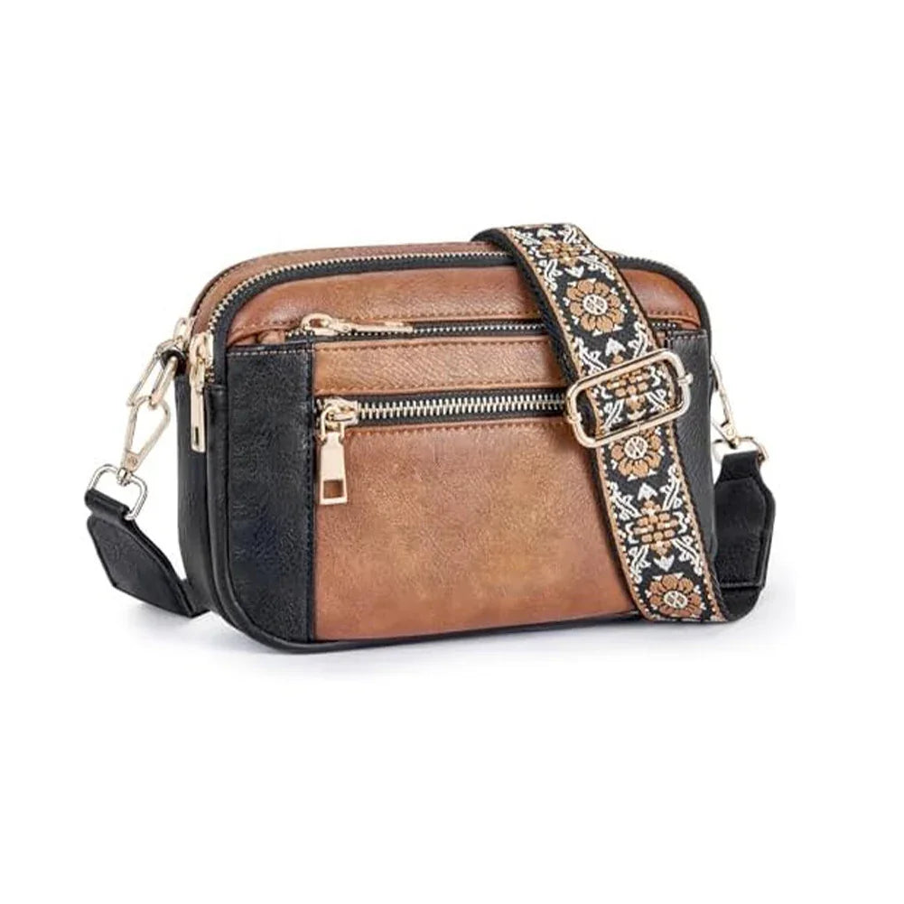 Multicolored crossbody bag with a decorative strap on a white background