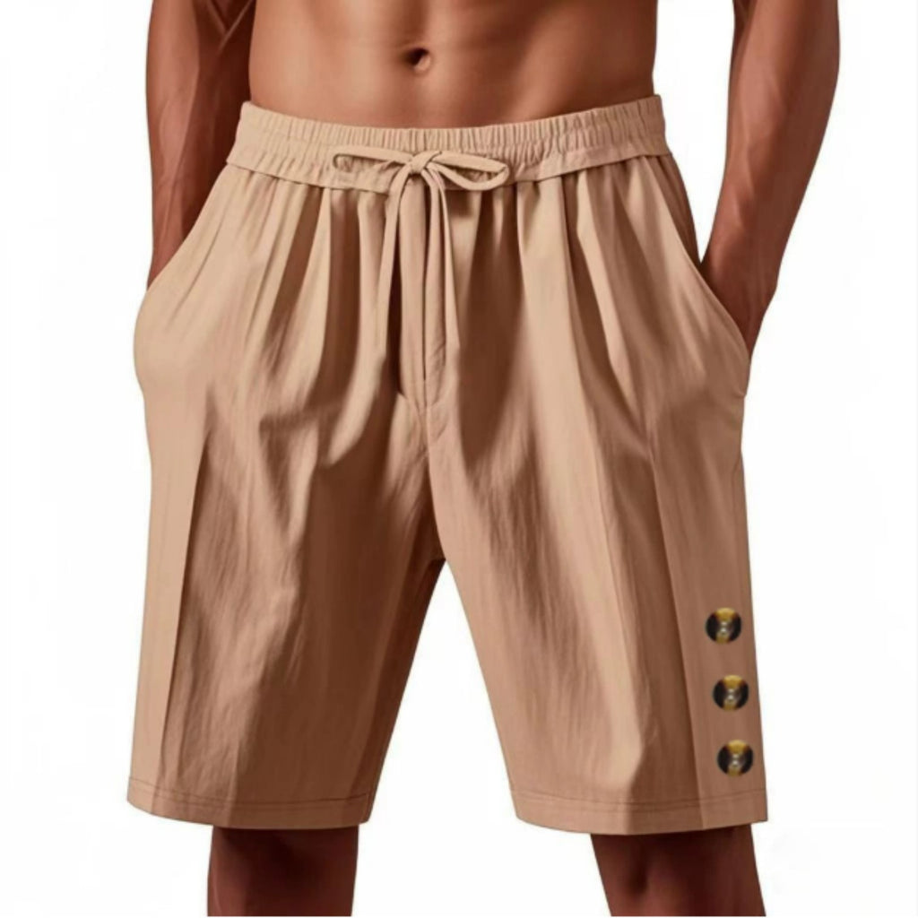 Beige shorts with gold buttons on a white background