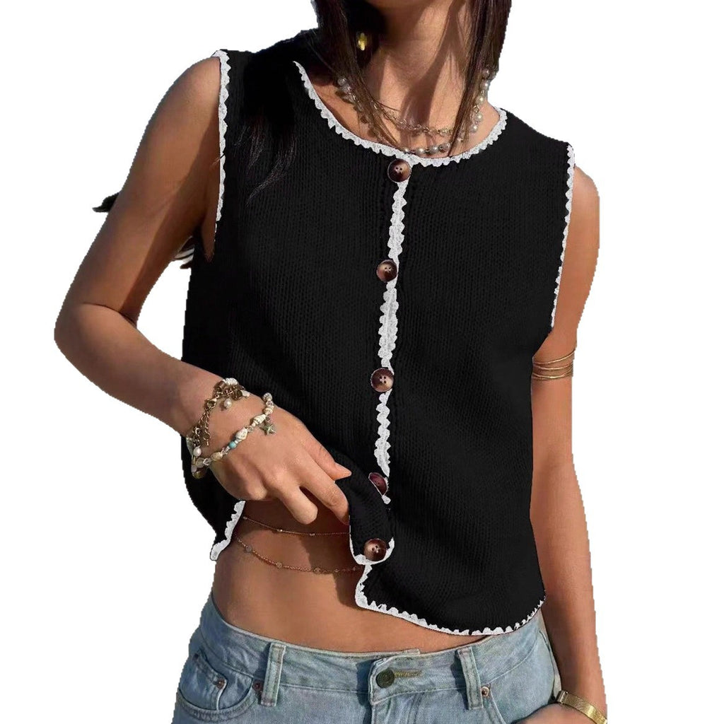 Black sleeveless top with white trim and buttons worn by a person on a white background