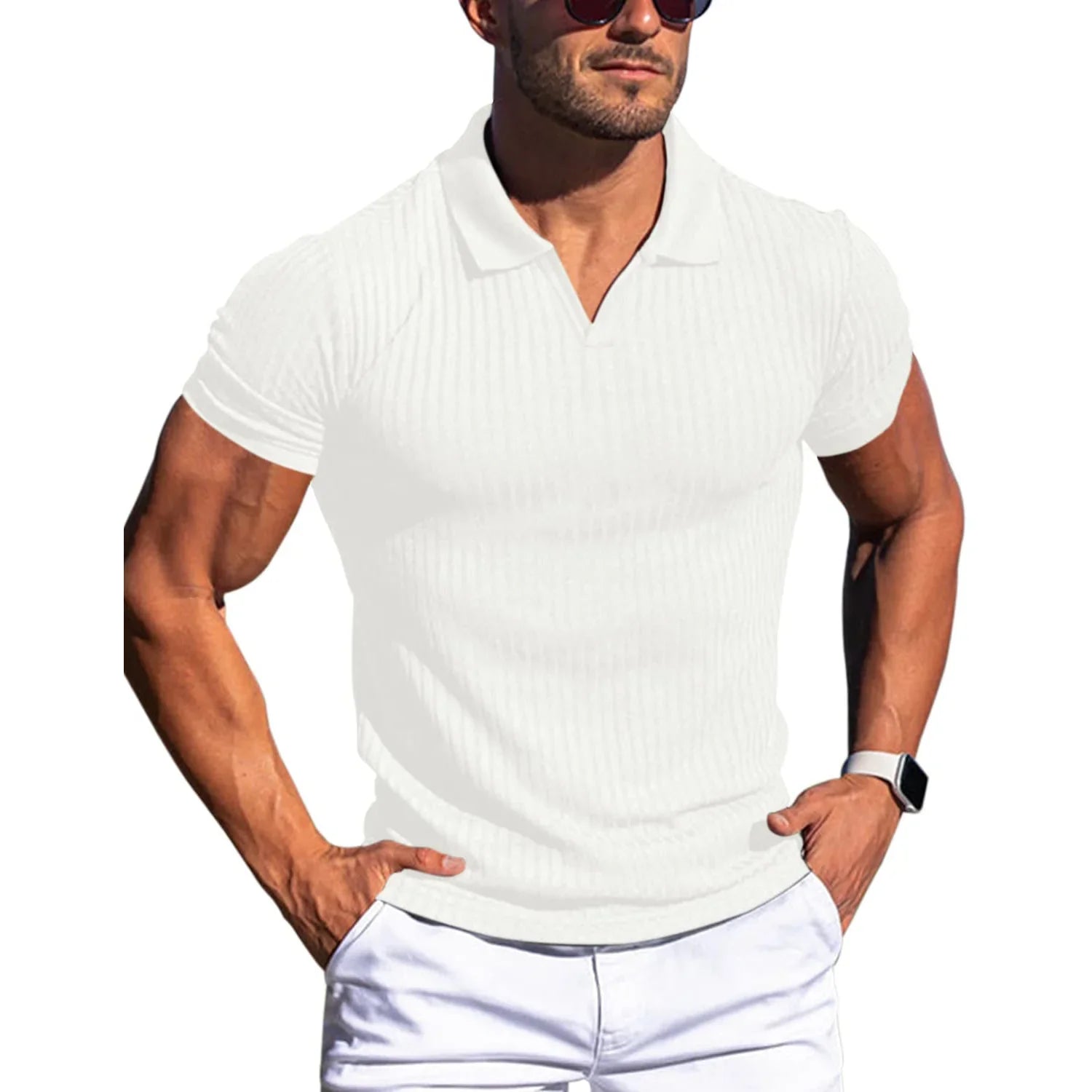 Man wearing a white ribbed polo shirt and white pants on a white background
