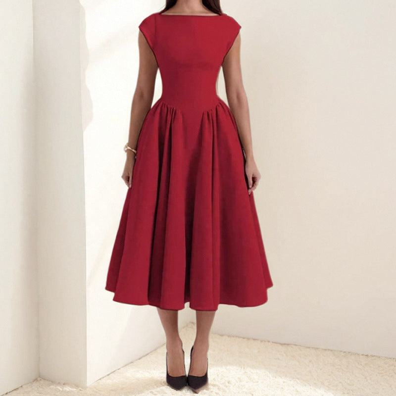 Red dress worn by a person against a white background