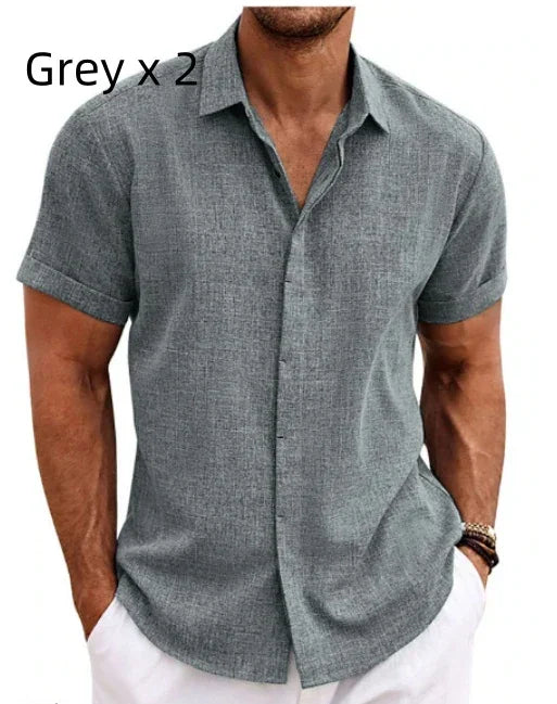 Man wearing a gray short-sleeve shirt on a white background