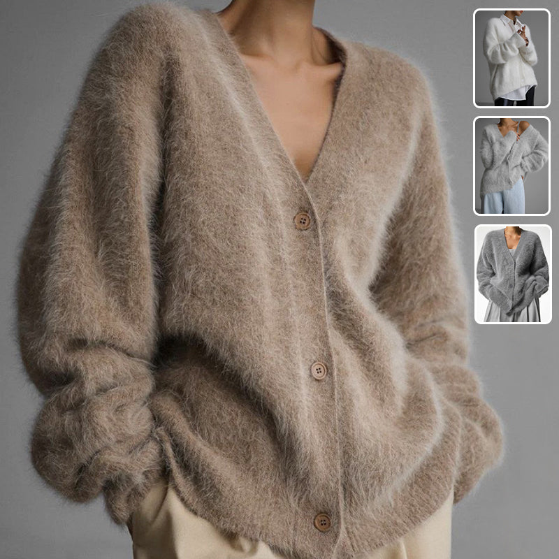 A fuzzy long-sleeve V-neck cardigan sweater in a warm taupe-beige color, shown on a model. The image includes three small inset thumbnails on the right showing the cardigan in white, taupe, and gray.