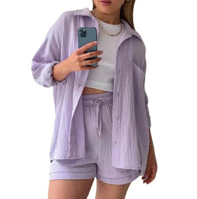 Woman wearing lilac lounge set with button shirt and shorts, white crop top, ZA-Zola fashion