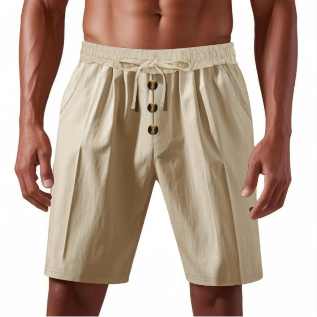 Beige shorts with button details on a white background