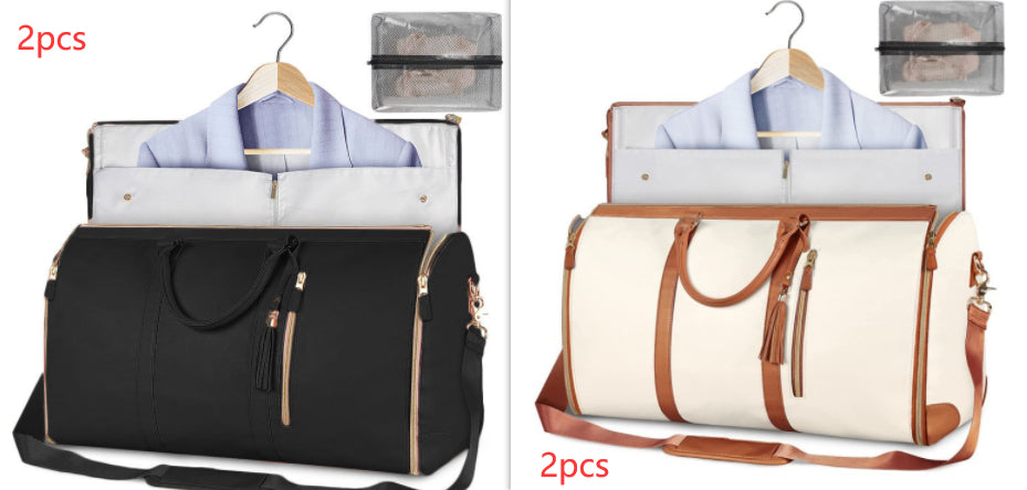 Two black bags with hangers and shirts, one black and one white with brown straps.