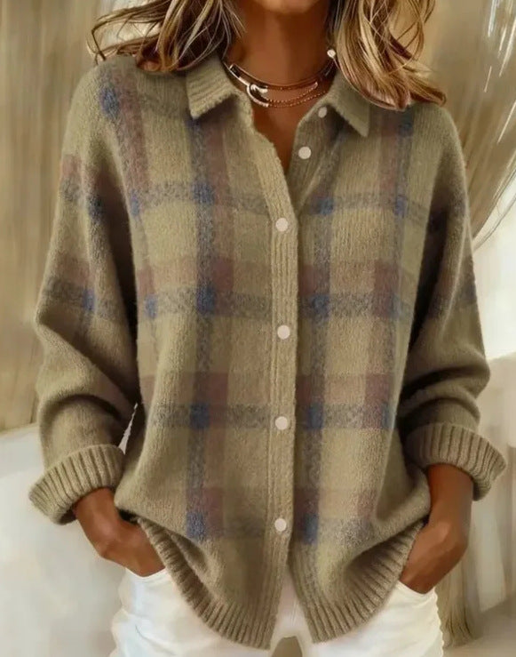 Plaid patterned cardigan worn by a person with a neutral background
