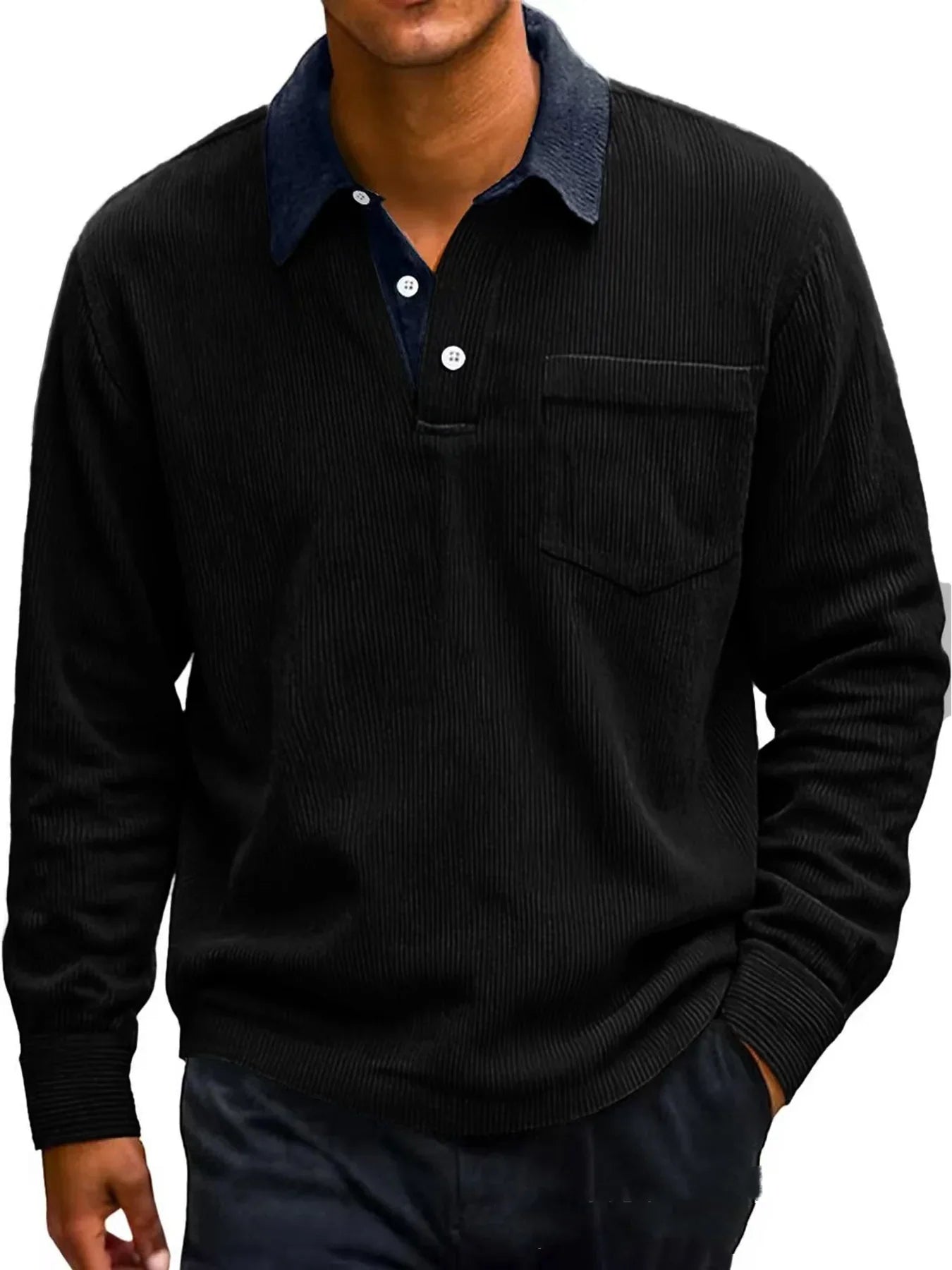 Black corduroy shirt worn by a person on a white background