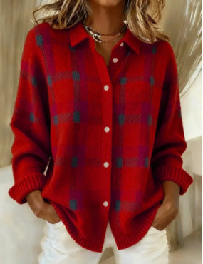 Red plaid sweater worn by a person with a neutral background