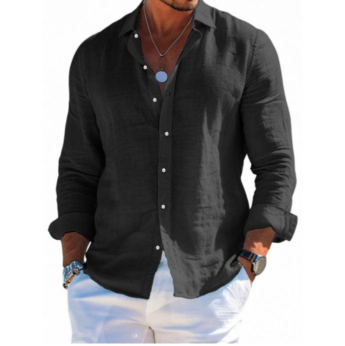 Black button-up shirt worn by a person on a white background