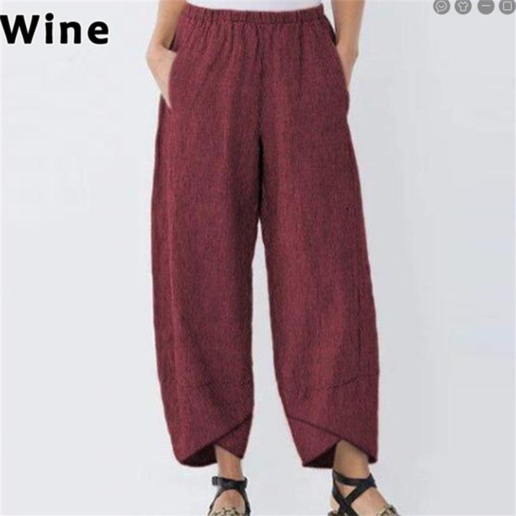 Wine-colored wide-leg pants on a white background with 'Wine' text above.