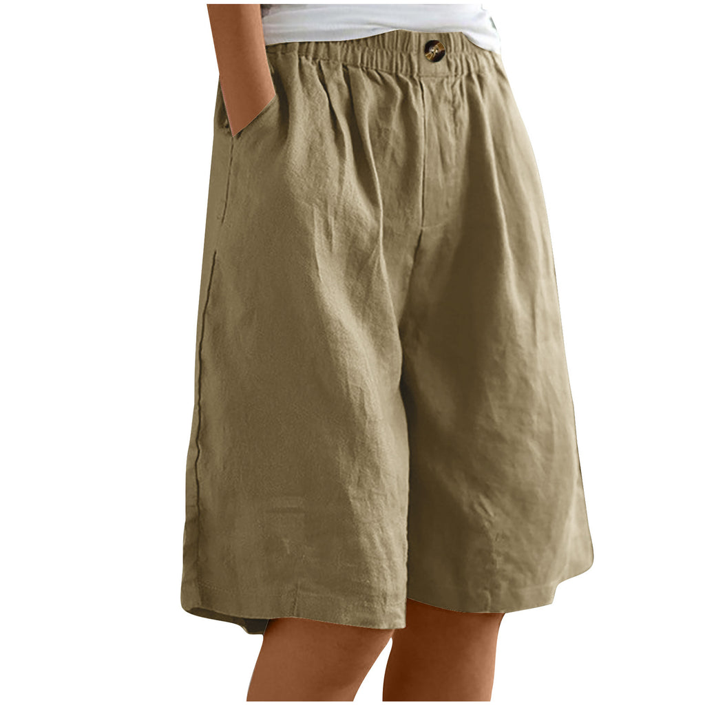 Khaki shorts worn by a person on a white background
