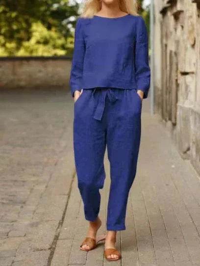 Woman wearing a chic blue loungewear set from ZA-Zola, stylish casual outfit outdoors