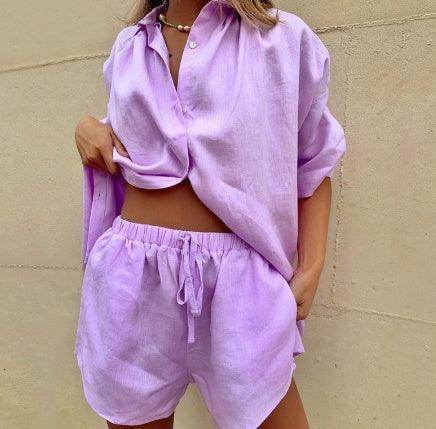 Woman wearing a light purple linen shirt and shorts set, chic fashion from ZA-Zola UK