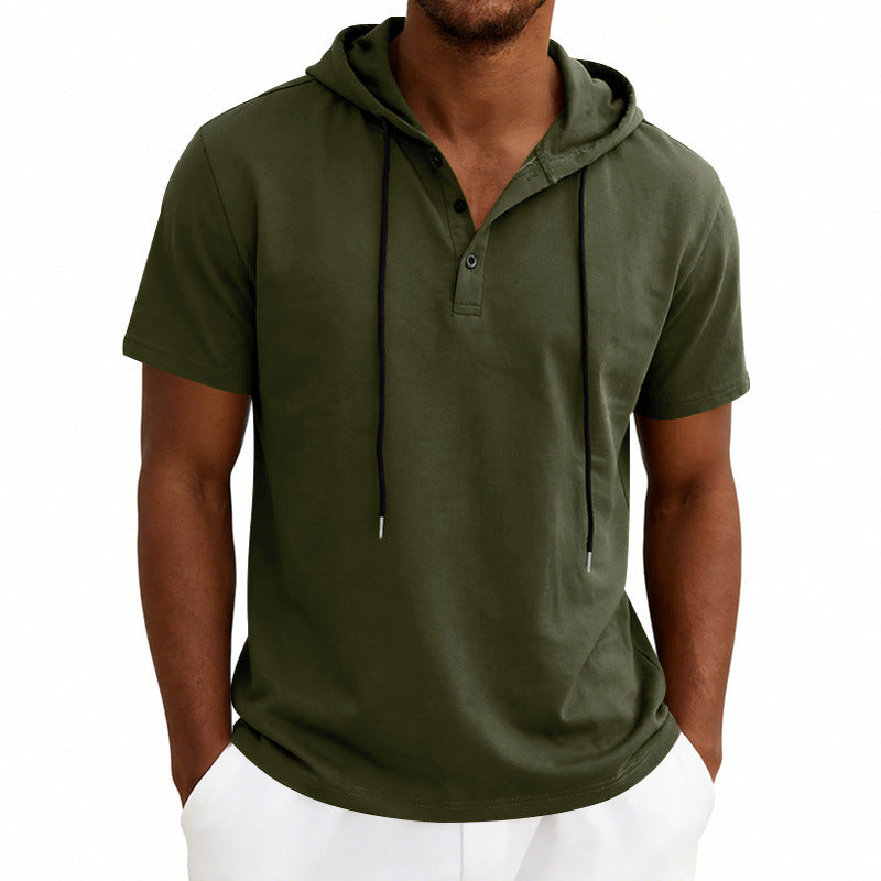 Green short-sleeve hoodie worn by a person on a white background