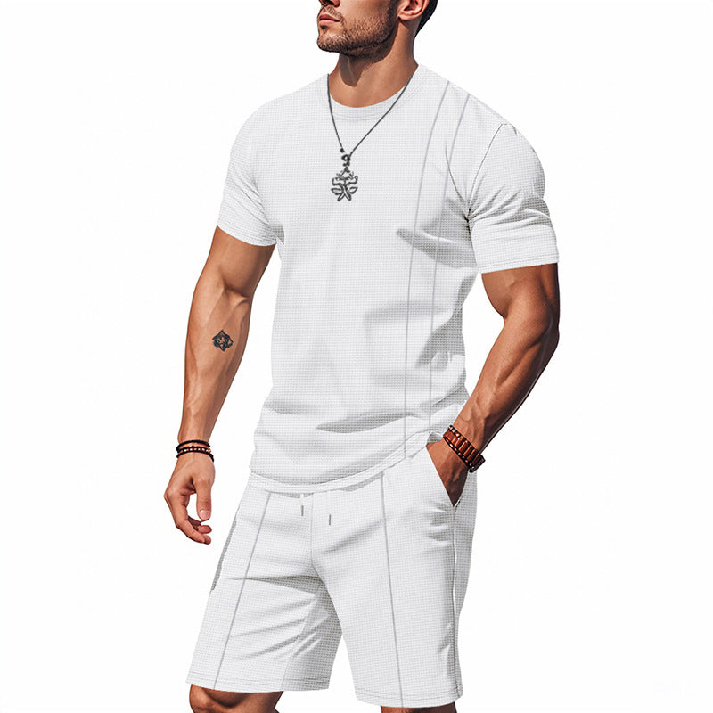 Man wearing a white t-shirt and shorts set on a white background
