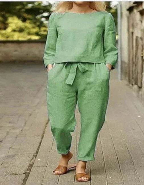 Woman wearing a green linen two-piece set with tie waist pants, ZA-Zola chic fashion style