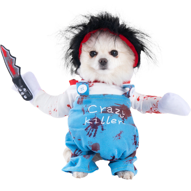Dog in a Halloween costume with blue overalls and red headband, holding a toy knife.